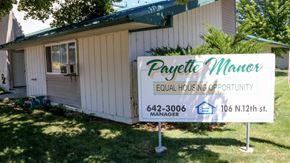Payette apartment for rent - a real estate sign in front of a house
