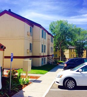 Pendleton apartment for rent - an apartment building with cars parked in front of it