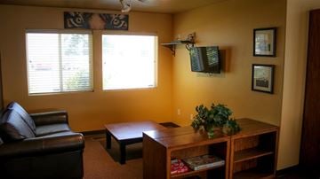 Burley apartment for rent - a living room with a couch and a table