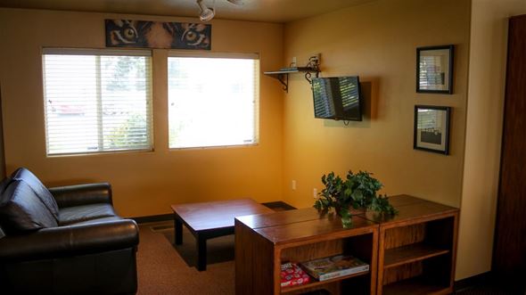 Burley apartment for rent - a living room with a couch and a table