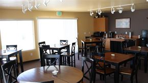 Burley apartment for rent - a dining room and kitchen with tables and chairs
