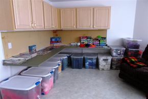 Caldwell apartment for rent - a kitchen with storage bins and a counter in it