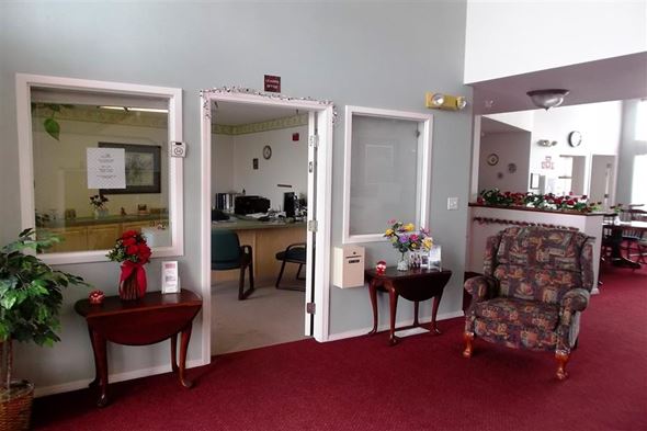 Caldwell apartment for rent - a living room with a chair and a table