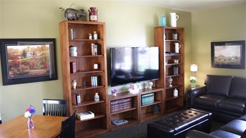 Heyburn apartment for rent - a living room with a television and a table