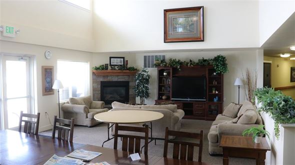 Idaho Falls apartment for rent - a living room with a couch and a table