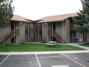Caldwell apartment for rent - a building with a picnic table in front of it