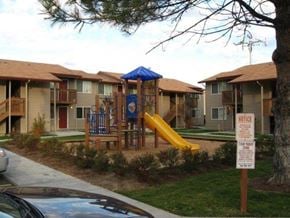 Caldwell apartment for rent - an empty playground in front of an apartment complex