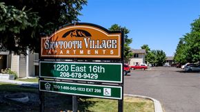 Burley apartment for rent - a sign that reads savannah villages apartments    in front of a street