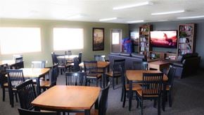 Mountain Home apartment for rent - a dining room with tables and chairs and a tv
