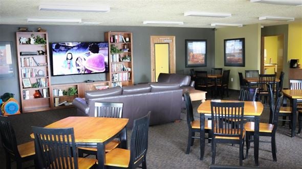 Mountain Home apartment for rent - a living room with tables and chairs and a tv