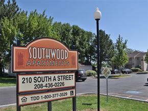 Rupert apartment for rent - a sign for southwood apartments in a parking lot