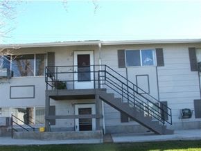 Buhl apartment for rent - a white house with stairs and a front door