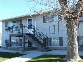 Buhl apartment for rent - a white house with a tree in front of it