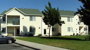 Lewiston apartment for rent - a car parked in front of a white house