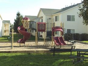 Lewiston apartment for rent - a playground with two slides and a house