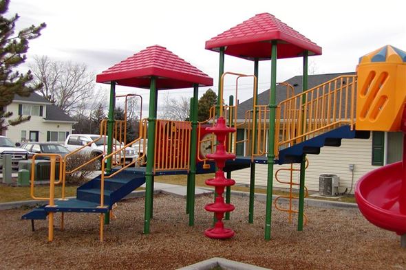 Kuna apartment for rent - a playground with a swing set and some stairs