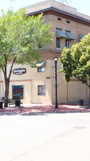 Nampa apartment for rent - a building with a street light and trees in front of it