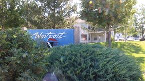 American Falls apartment for rent - a blue sign in front of a building