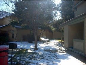 Boise apartment for rent - a snow covered yard in front of a house