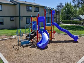 Weiser apartment for rent - a playground with a blue slide and slides