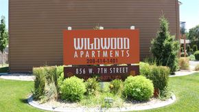 Weiser apartment for rent - a sign for willow apartments in front of a building