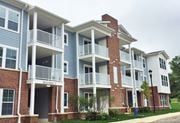 Westampton apartment for rent - a row of apartment buildings with balconies and stairs