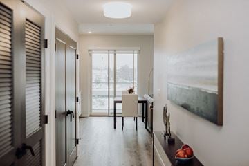 Grand Rapids apartment for rent - a living room and dining room with a table and a window