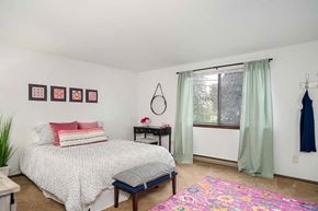 N. Tonawanda apartment for rent - a white bedroom with a bed and a window