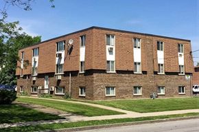 N. Falls apartment for rent - a brick apartment building on the side of a sidewalk