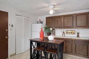 N. Falls apartment for rent - a kitchen with a table and some stools