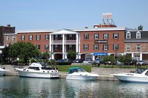 N. Tonawanda apartment for rent - three boats are docked in the water in front of a building