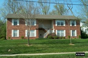 Liberty apartment for rent - A house with a tree in front of it.