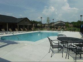 Enterprise apartment for rent - Pool With Relaxing Chairs at Heron Cove, Enterprise