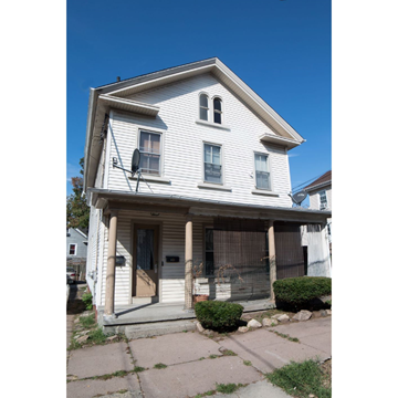 New Haven apartment for rent - A white house with a brown door and windows.
