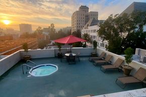 Hollywood apartment for rent - a rooftop pool with a city skyline in the background