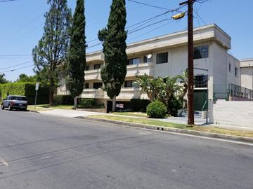 Van Nuys apartment for rent - an apartment building on the corner of a street