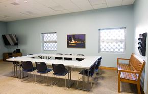 Boston apartment for rent - Community room with windows, large table, plentiful seating, and more.