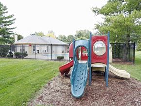 Monroe townhouse for rent - a childrens playground with a slide and a mirror