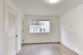 San Francisco apartment for rent - A room with a window and a door.