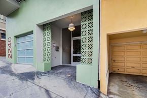 San Francisco apartment for rent - A green building with the number 2240 on it.