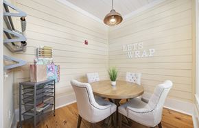 Richmond apartment for rent - a dining room with white walls and a table and chairs