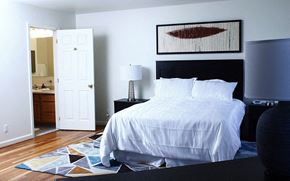 West Point apartment for rent - a bedroom with a white bed and a bathroom
