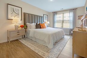 Sewell apartment for rent - a bedroom with a large bed and a window