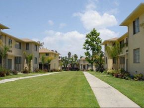 Los Angeles apartment for rent - A row of houses with a pathway in the middle.