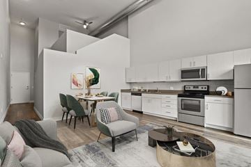 Denver apartment for rent - a living room with a couch and a table