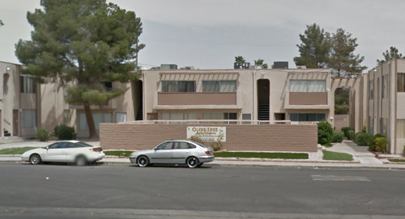 Las Vegas apartment for rent - a building is shown with cars parked in front of it