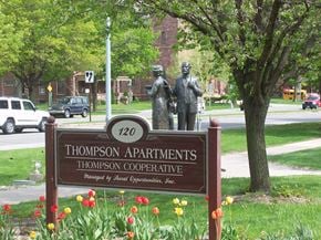Canandaigua apartment for rent - a sign in front of a tree
