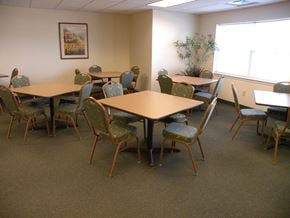 Rochester apartment for rent - a dining room with tables and chairs