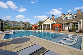 Charlotte apartment for rent - Swimming Pool. Big spacious pool with chairs in shallow end, loungers, cabanas at Ascent at Mallard Creek Charlotte, NC