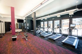 Fitness center at confluence on 3rd apartments in des moines in downtown des moines